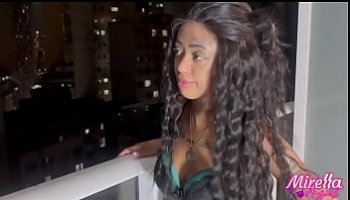 woman rock climbing naked